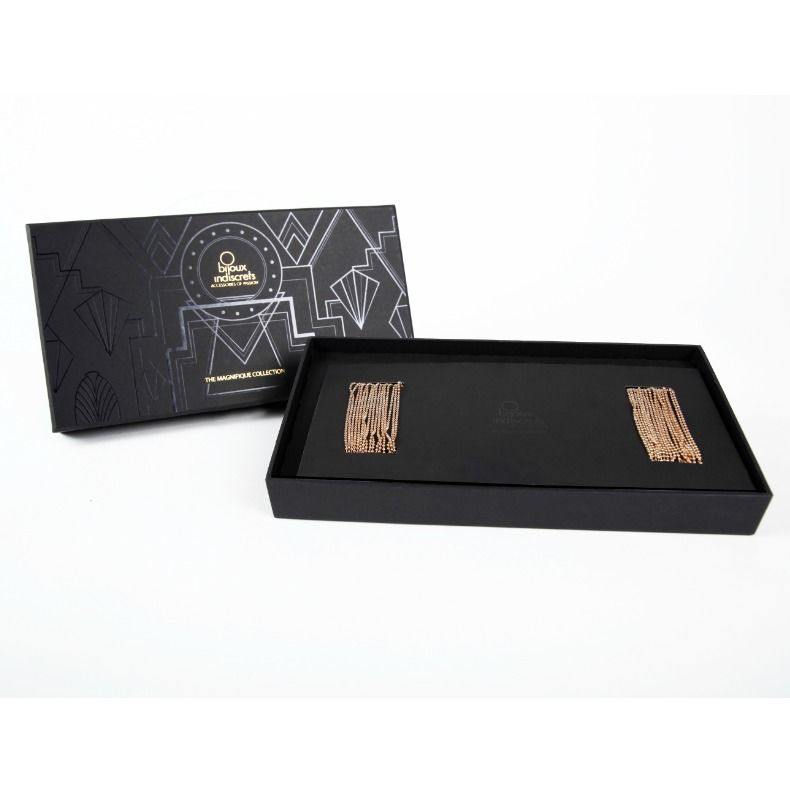 midjesmycke magnifique i guldfärgade metallkedjor